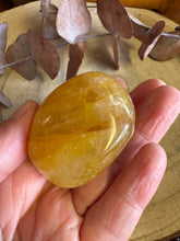 Golden Healer Quartz Palm Stone SKU 26074
