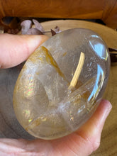 Golden Healer Quartz Palm Stone SKU 25842