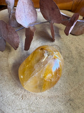 Golden Healer Quartz Palm Stone SKU 26074